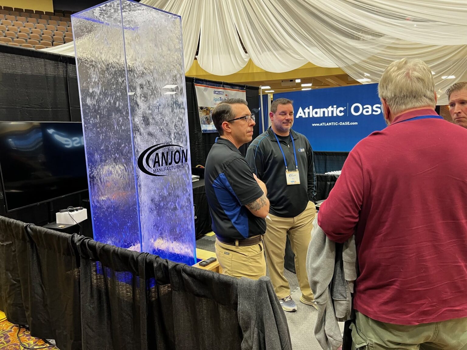 Booth conversation on the show floor